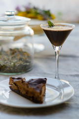 Smothy drink and chocolate dessert on the table..