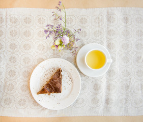 herbal tea and chocolate dessert on the table..