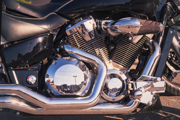 Engine of a powerful black motorcycle