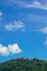 Television phone radio antenna on mountain clear blue sky