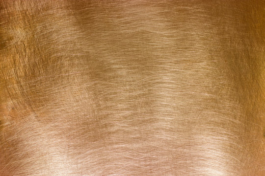 Gold plate, texture of golden metal, background