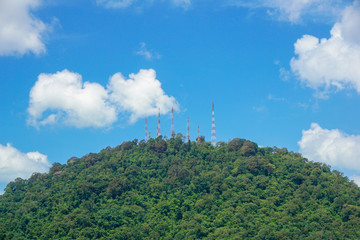 Television phone radio antenna on mountain clear blue sky