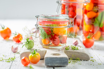Fresh ingredients for canned red tomatoes in summer