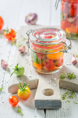 Natural and healthy canned red tomatoes in the jar