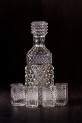 Cut Glass Crystal Decanter Set on Brown Background