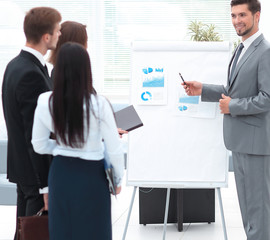 senior Manager makes a presentation in the office.