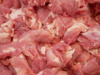 Selective focus and close up of pieces of raw pork meat