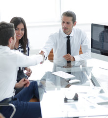 Business people shaking hands, finishing up a meeting