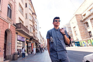 young and confident businessman on the street