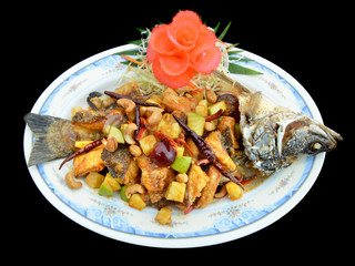 Barramundi or silver perch cooking in Thai style