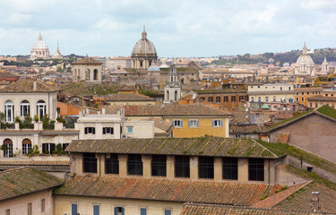 Fototapeta na wymiar Rome skyline, with its palaces and the beautiful cupolas of its churches