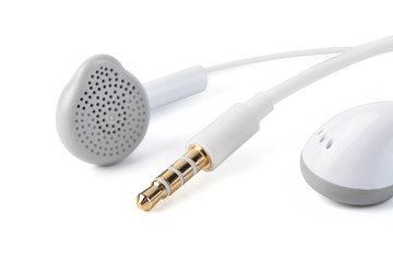 White headphones on a white background, close up