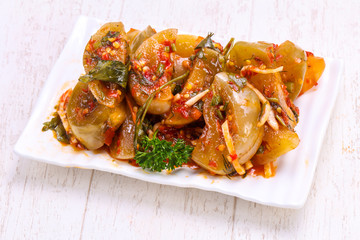 Pickled green tomato