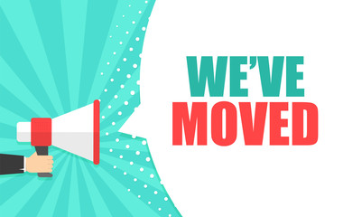 Male hand holding megaphone with We've moved speech bubble. Loudspeaker. Banner for business, marketing and advertising. Vector illustration.