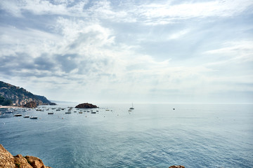 Beach at Tossa de Mar and fortress in a beautiful summer day, Costa Brava, Catalonia, Spain