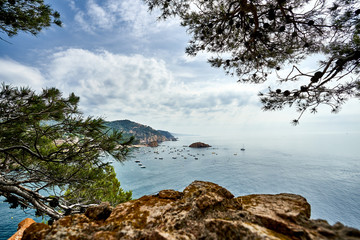 Beach at Tossa de Mar and fortress in a beautiful summer day, Costa Brava, Catalonia, Spain