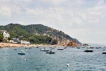 Beach at Tossa de Mar and fortress in a beautiful summer day, Costa Brava, Catalonia, Spain