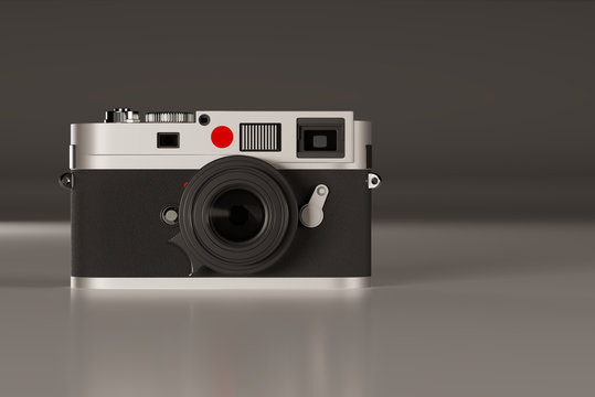 Front Of Leica Camera On Gray Semi-glossy Floor