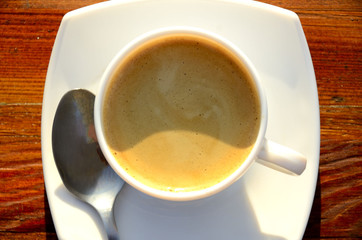 Morning espresso with foam, top view.