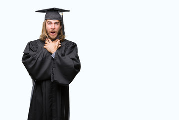 Young handsome graduated man with long hair over isolated background shouting and suffocate because painful strangle. Health problem. Asphyxiate and suicide concept.