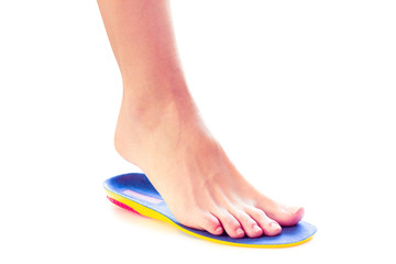 orthopedic insole and female leg