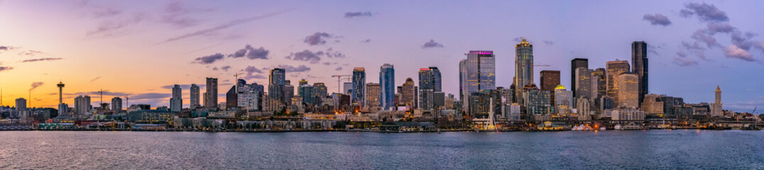 Beautiful Seattle skyline or cityscape from Elliot Bay, Puget Sound, at dusk or sunrise, Washington state, USA. - obrazy, fototapety, plakaty