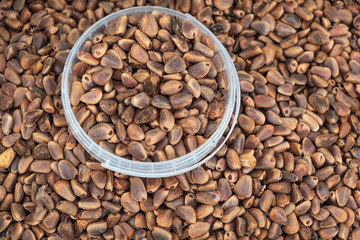 Pine nuts background closeup photo