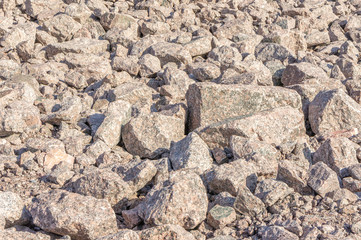 Texture of granite stones piled in a heap