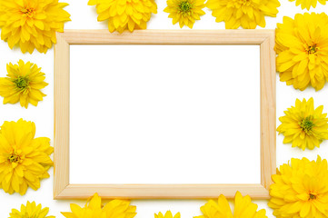 Wooden photo frame decorated with yellow Heliopsis flowers.