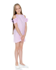 Elegant girl in a dress.