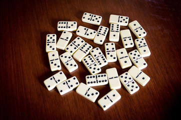 Domino game on the wooden table