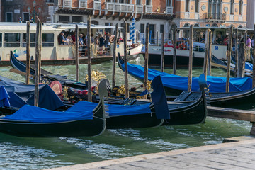View of some fascinating docked gondolas in Venice Italy 