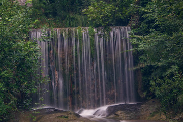 Naklejka premium View of a beautiful waterfall in the province of Belluno italy 