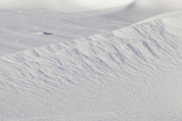 wavy drifts with snow