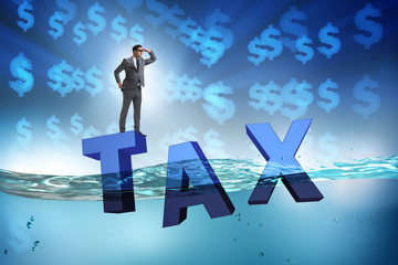 Businessman having problems with paying taxes