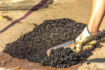 Worker sheltering hole with tar