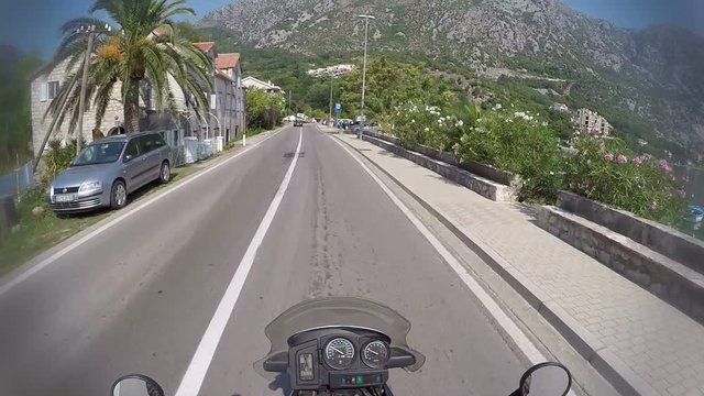 Driving on rural road mountains of Montenegro, touring adventures, pov shot on action camera