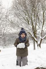Fototapeta na wymiar Boy in winter, close up