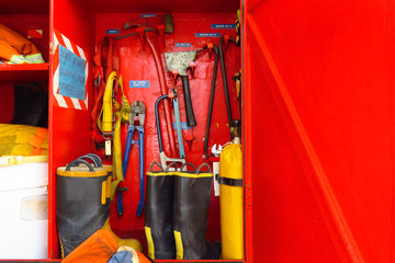 Firefighter equipment prepare for operation in cabinet.