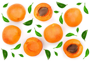 Apricot fruits with leaves isolated on white background. Top view. Flat lay pattern