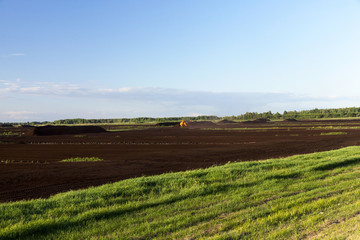 Fototapeta na wymiar production of peat landscape