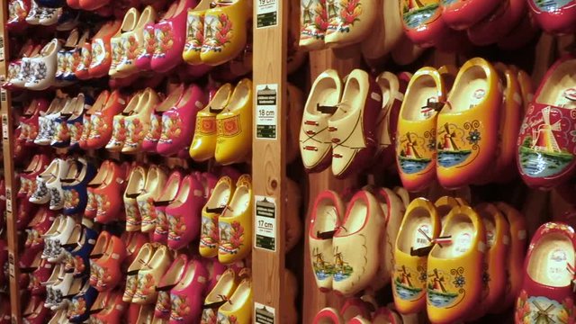 ZAANSE SCHANS, NETHERLANDS - APRIL 11: Dutch traditional wooden shoes, clogs, symbol of Netherlands for sale at the souvenir shop