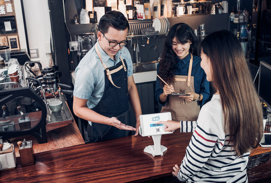 Customer Self Service Order Drink Menu With Tablet Screen And Pay Bill Online At Cafe Counter Bar,seller Coffee Shop Accept Payment By Mobile.digital Lifestyle Concept.