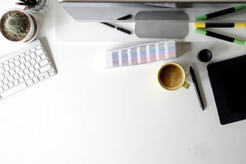 Workspace and copy space of graphic designer with tools.