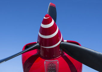 Airplane propeller on blue sky background