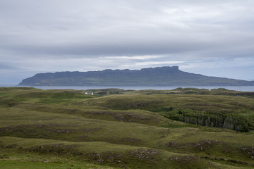 The Isle of Eigg as seen from the island of Muck.  Eigg is one of the Small Isles, in the Scottish Inner Hebrides.