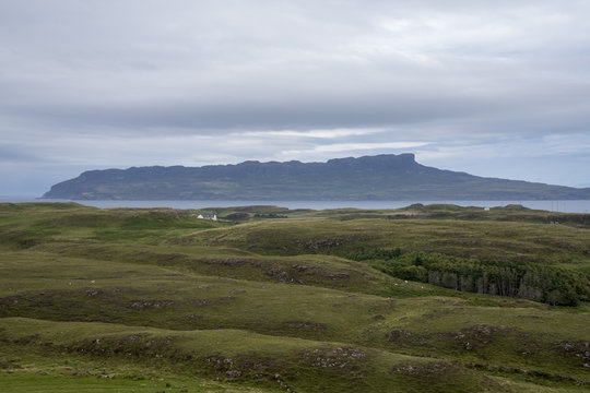 The Isle of Eigg as seen from the island of Muck.  Eigg is one of the Small Isles, in the Scottish Inner Hebrides.