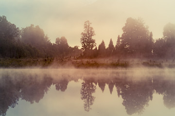 Matheson reflection water lake early morning, New Zealand natural landscape background