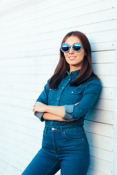 Stylish Autumn Girl in Denim Outfit Wearing Blue Matching Sunglasses