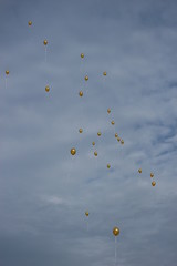 Golden baloons in the sky